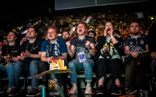 OG⁣ fans cheer on their team at the Dota 2 ESL One Birmingham tournament
